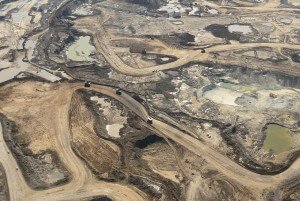 a wide perspective on Suncor's Millennium mine, one of the massive open pit mines north of Fort McMurray Alberta